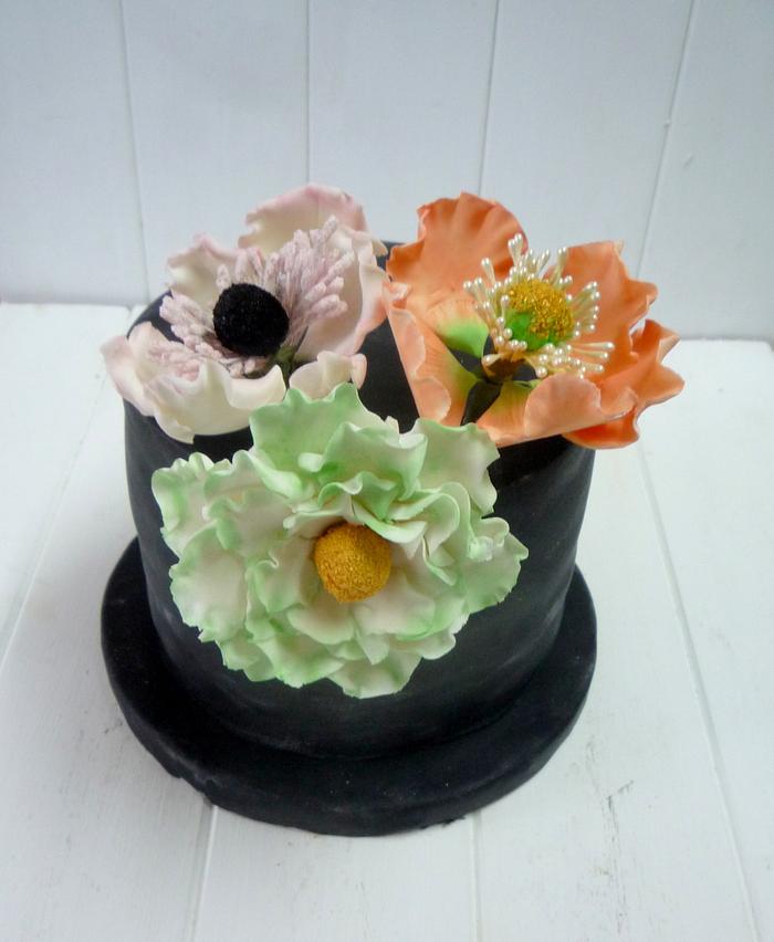 Birthday fondant black cake with flowers