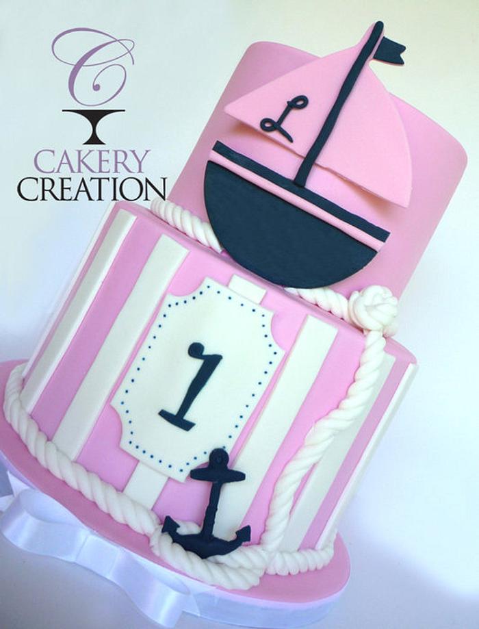 Pink and navy nautical cake and cookies to match invites