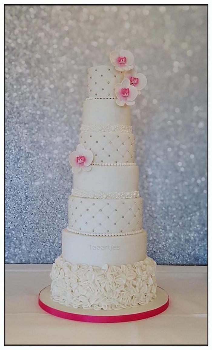 7 Tier Wedding Cake with ruffles and Orchids