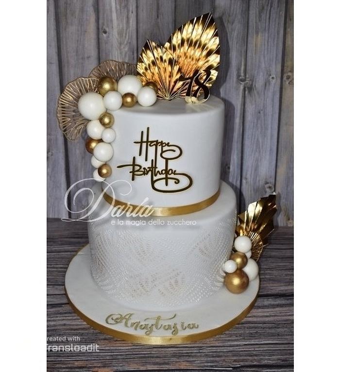 white and gold leaf cake