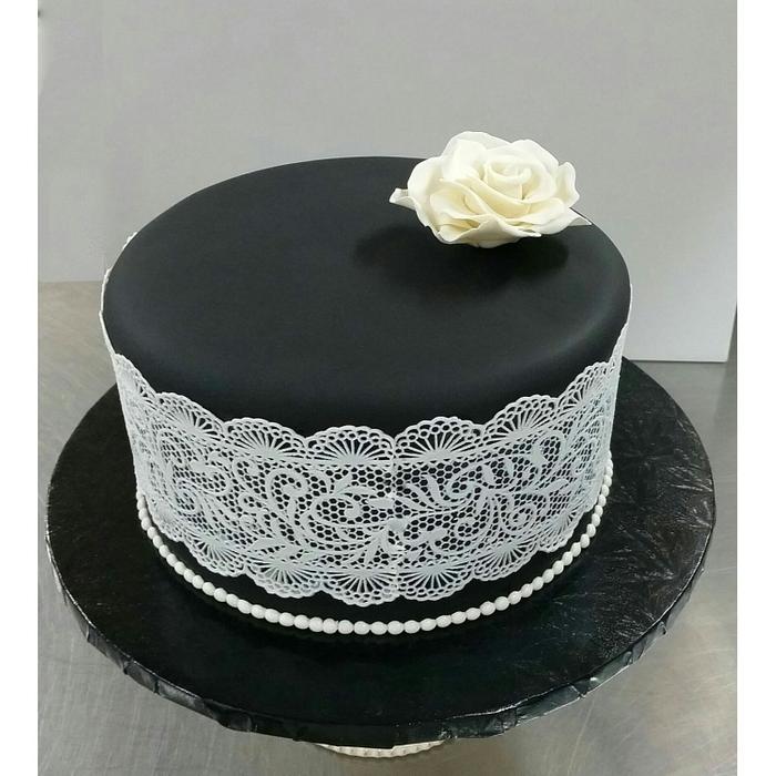 Classic Black and White Birthday Cake