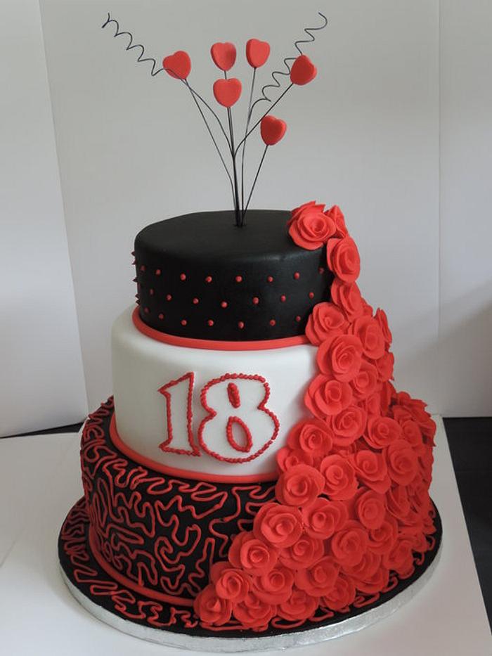 3 Tier black and red birthday cake