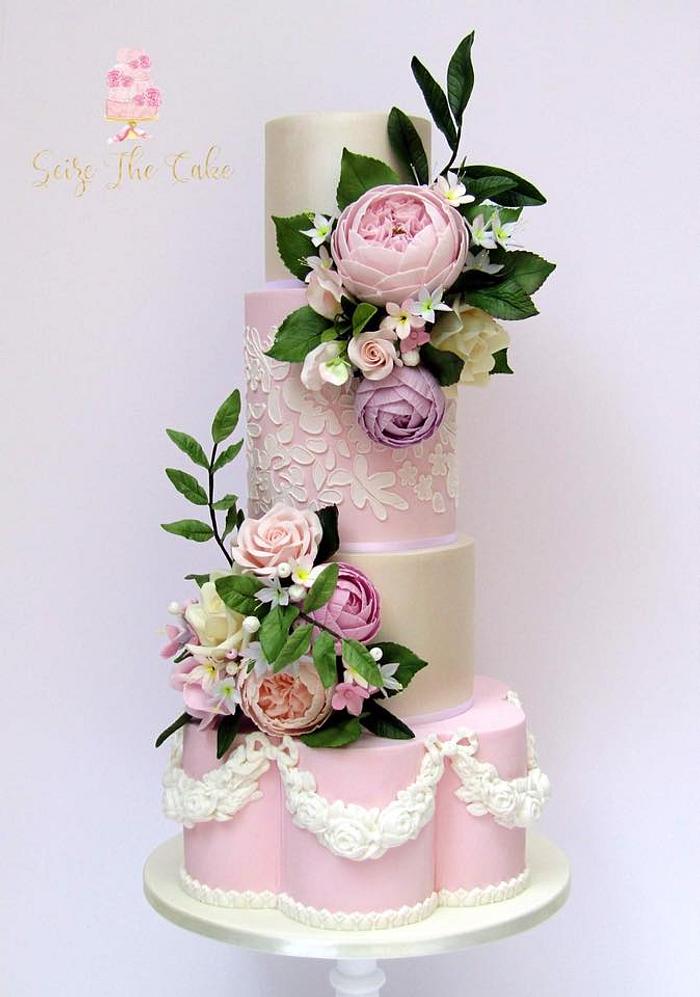 Classy pale pink and ivory wedding cake