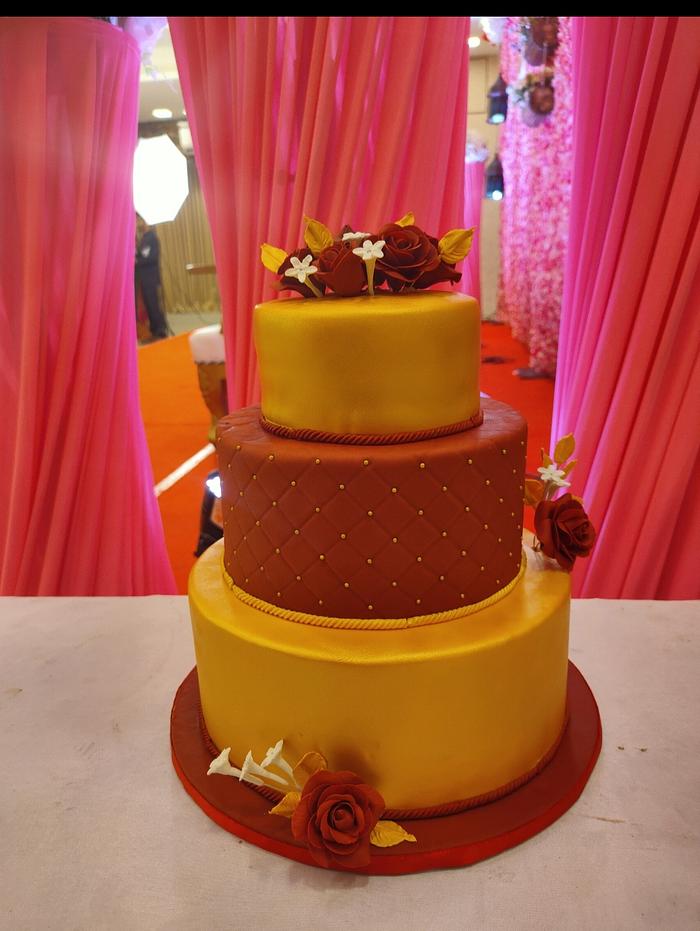 Red n gold wedding cake