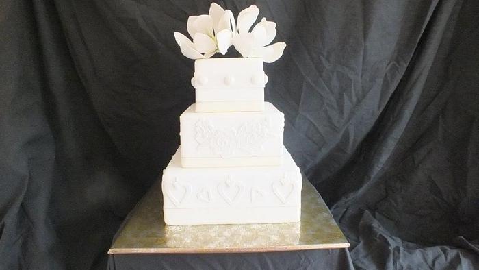 White & gold wedding cake