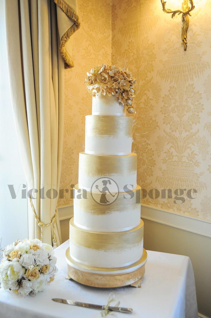 Golden Double Barrel Towering wedding cake!