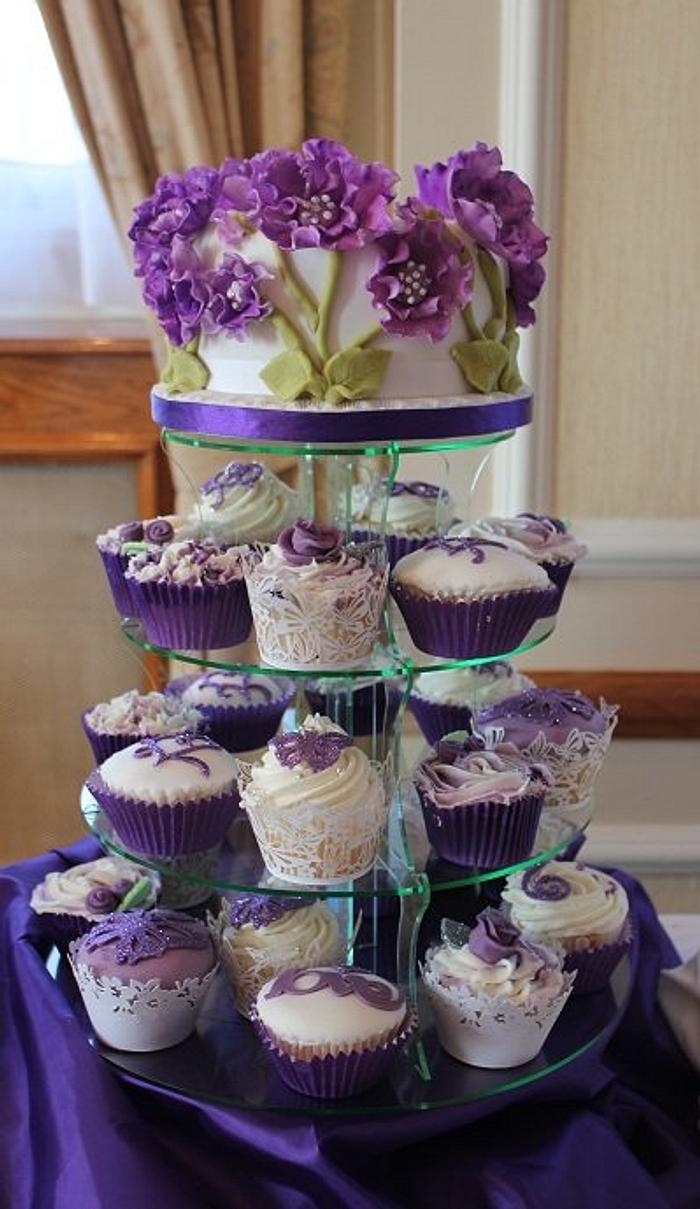 Purple peony topcake and purple cupcakes