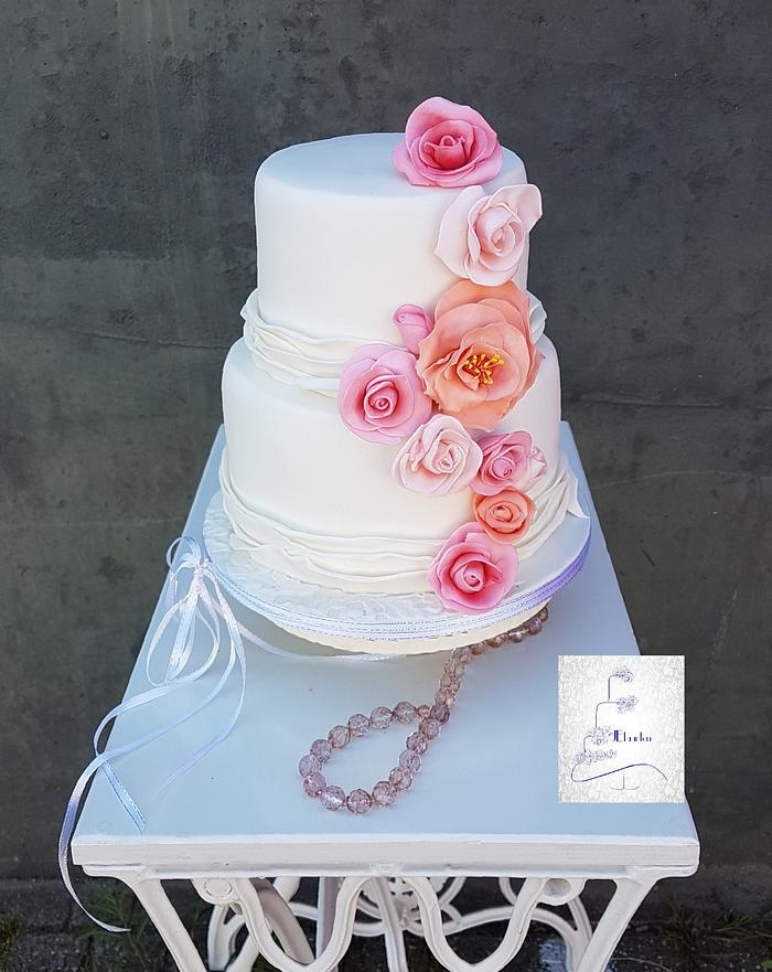 summer wedding surprise cake with bright colours
