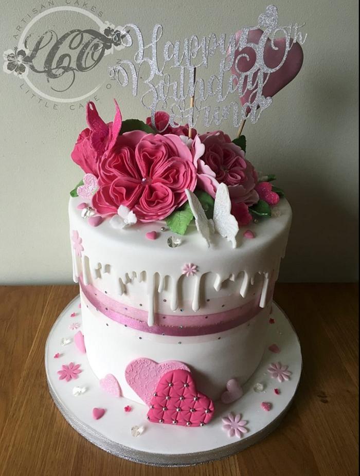 50th girlie pink drip cake