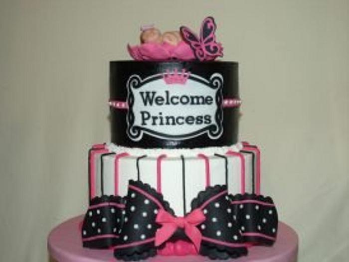 Hot pink and black baby shower cake