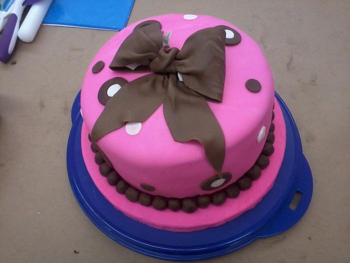 pink and brown ribbon cake