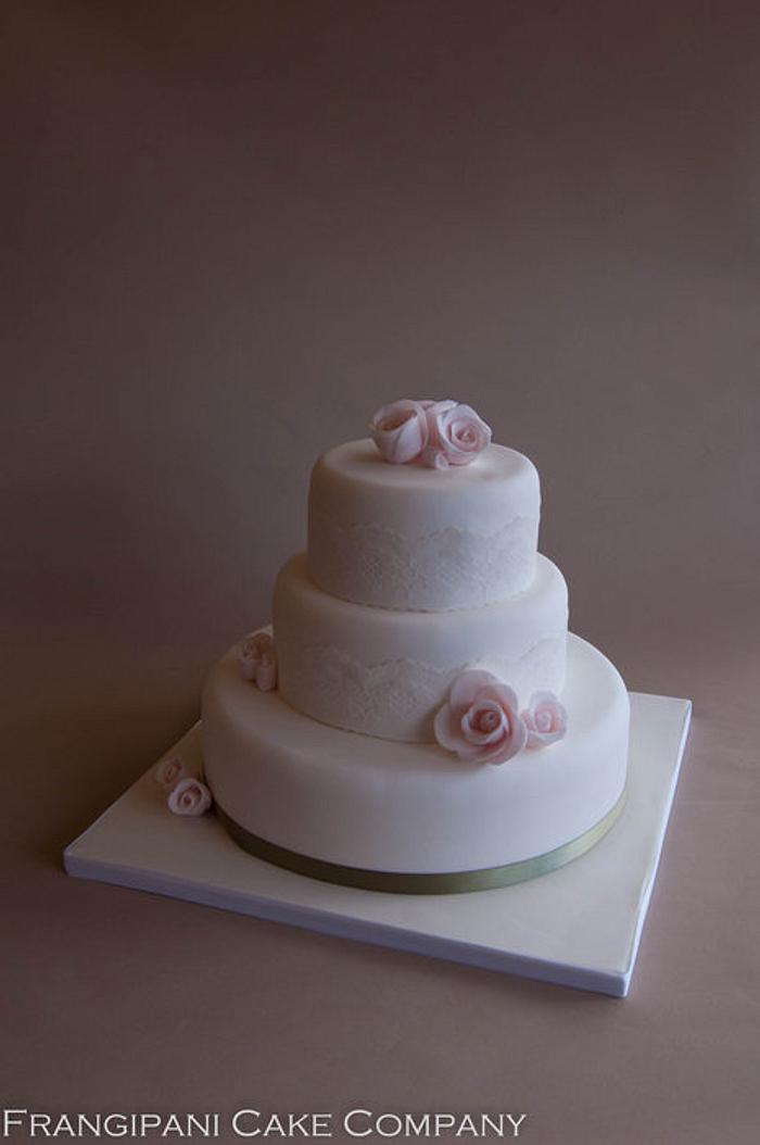 Pink rose & lace wedding cake