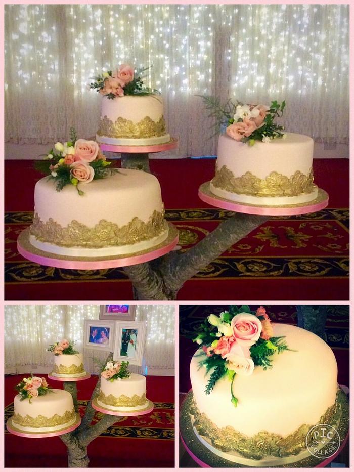 Vintage style wedding cake with gold detail