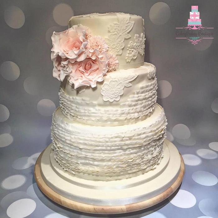 Ruffle and Lace wedding cake with blush pink ruffle roses