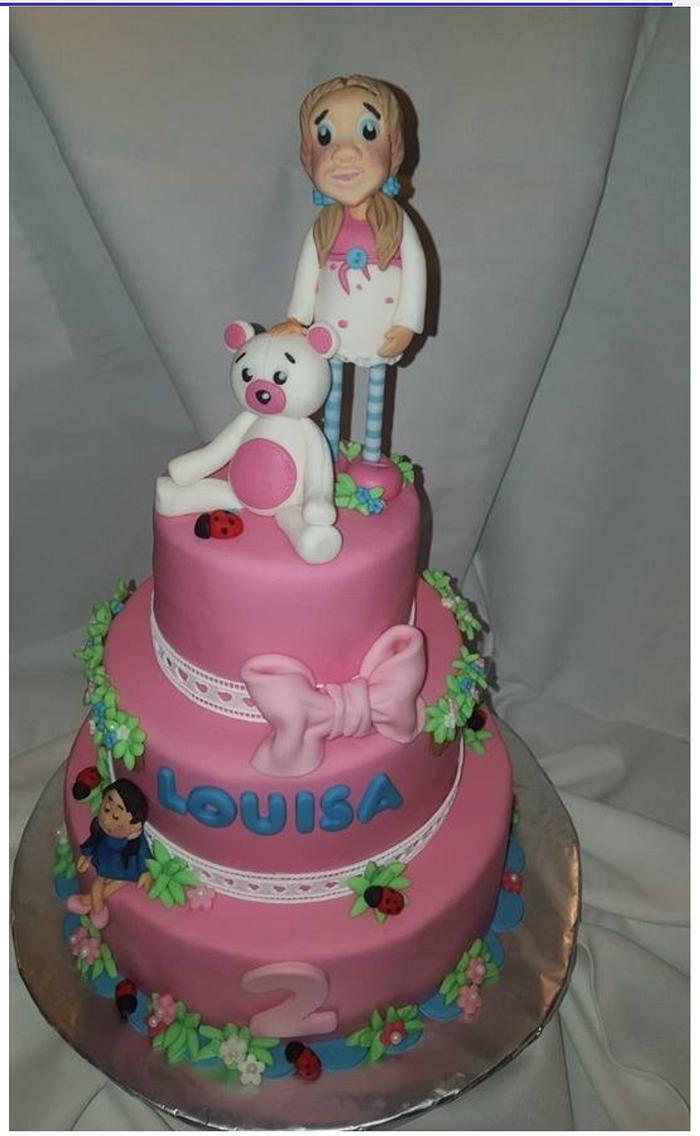 girly cake with doll