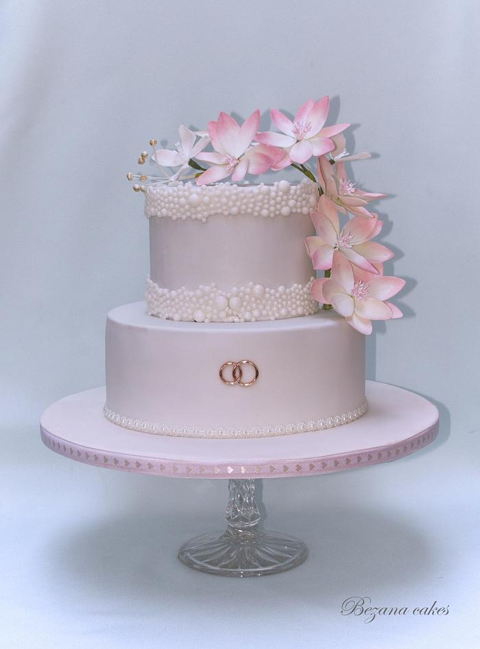 Wedding cake with pink flowers