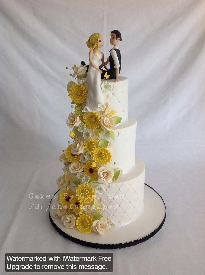 Yellow and cream wedding cake