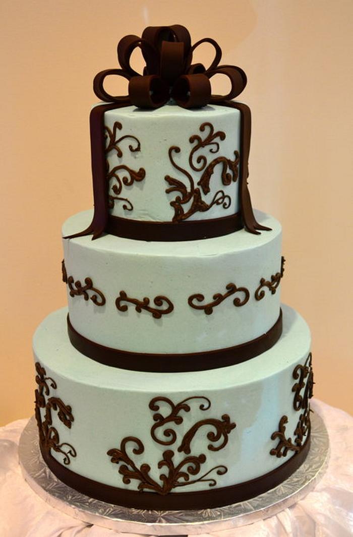 Teal cake with brown bow