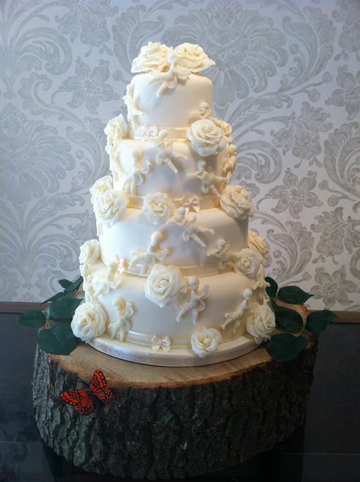 Whit Chocolate Cherub and Rose Wedding Cake