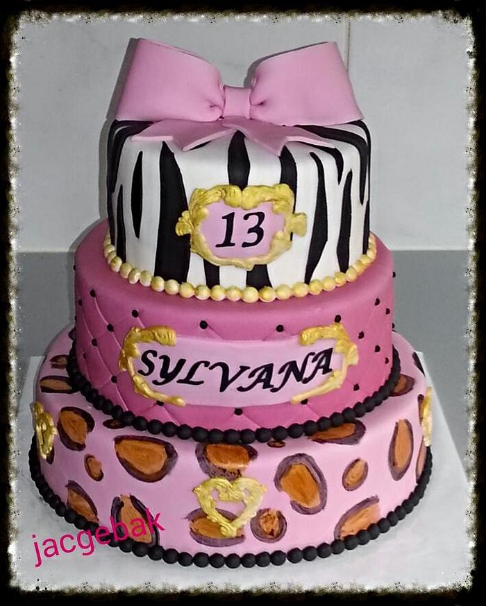 pink cake with animal prints