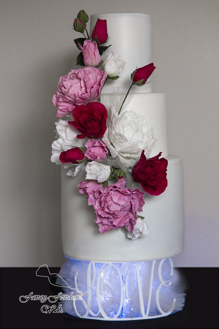 Peony and rose wedding cake