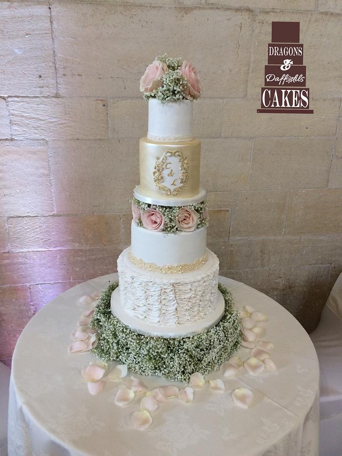 Vertical ruffles and rose wedding cake 