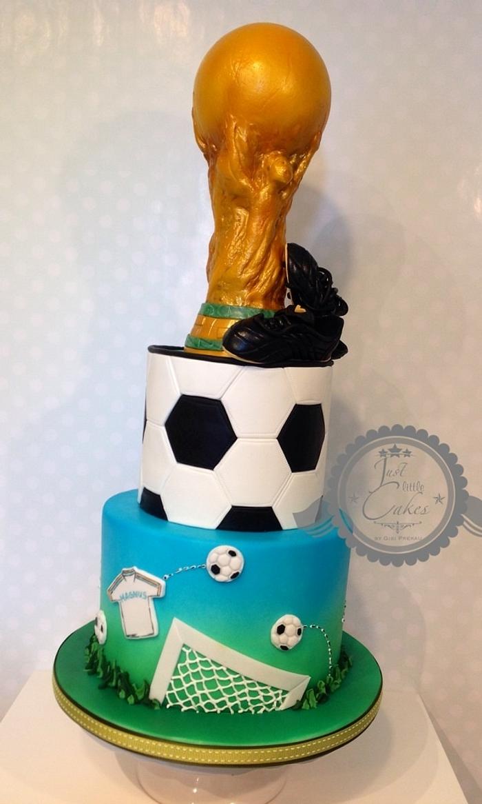Soccer cake with trophy