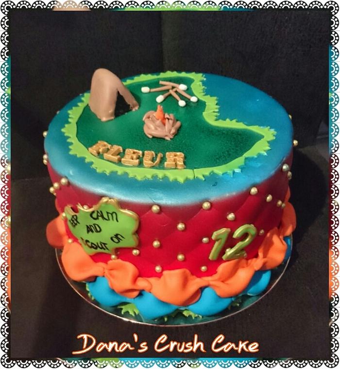 Girls scouting cake 