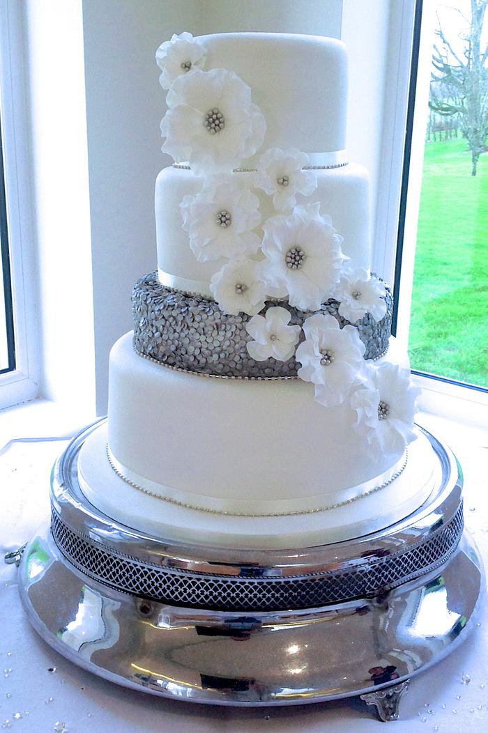 Silver and white wedding cake x x x
