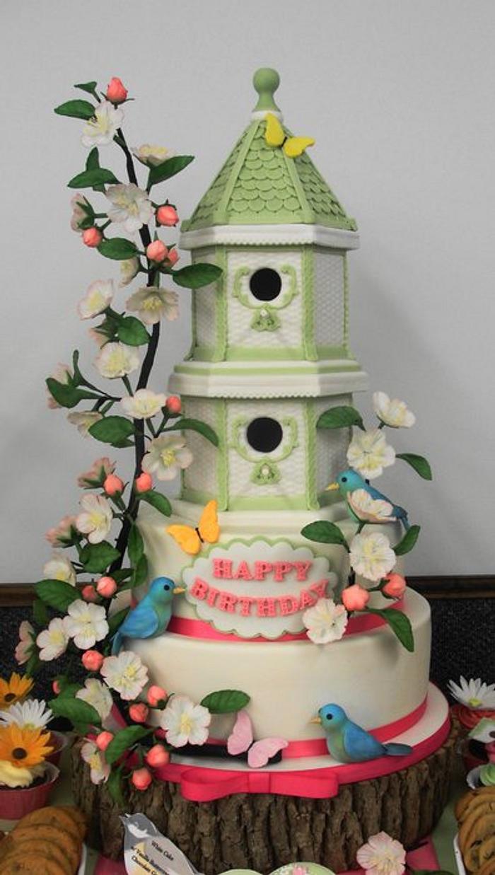 Spring themed bird house birthday cake