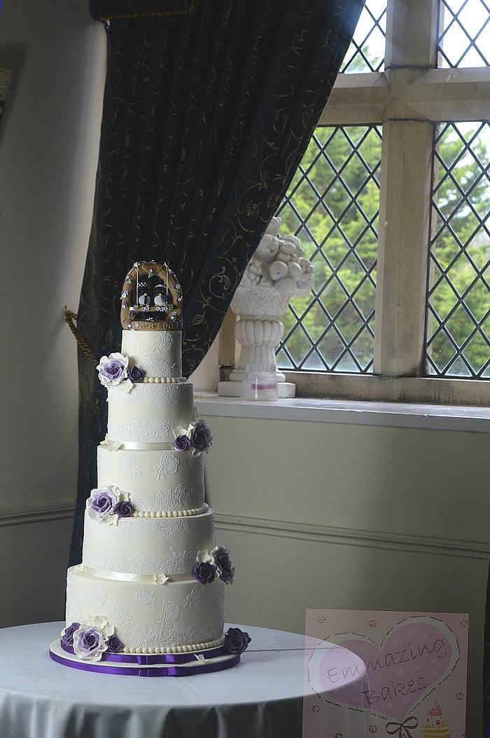 Penguins, lace and roses wedding cake