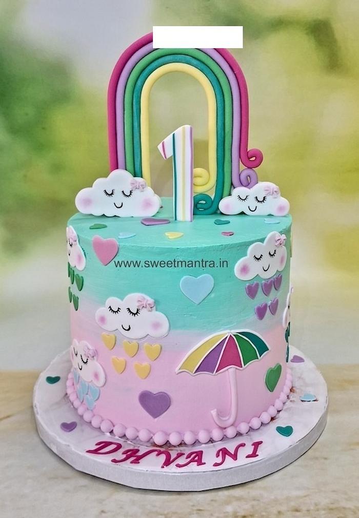 Rainbow theme cream cake for 1st birthday