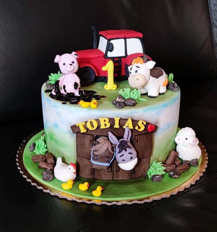 cake with animals and tractor