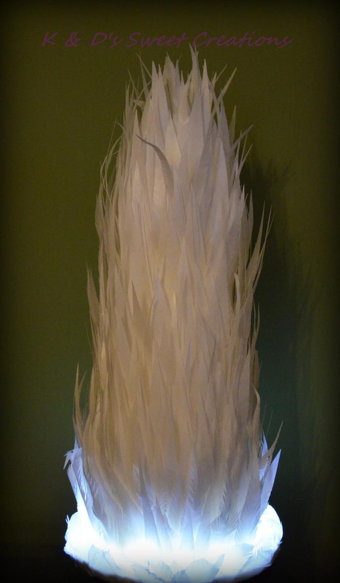 White feathers and sparkle wedding cake