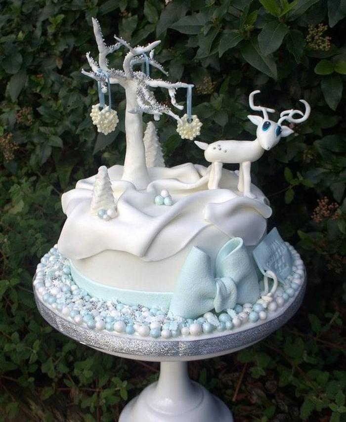 Blue and white reindeer cake
