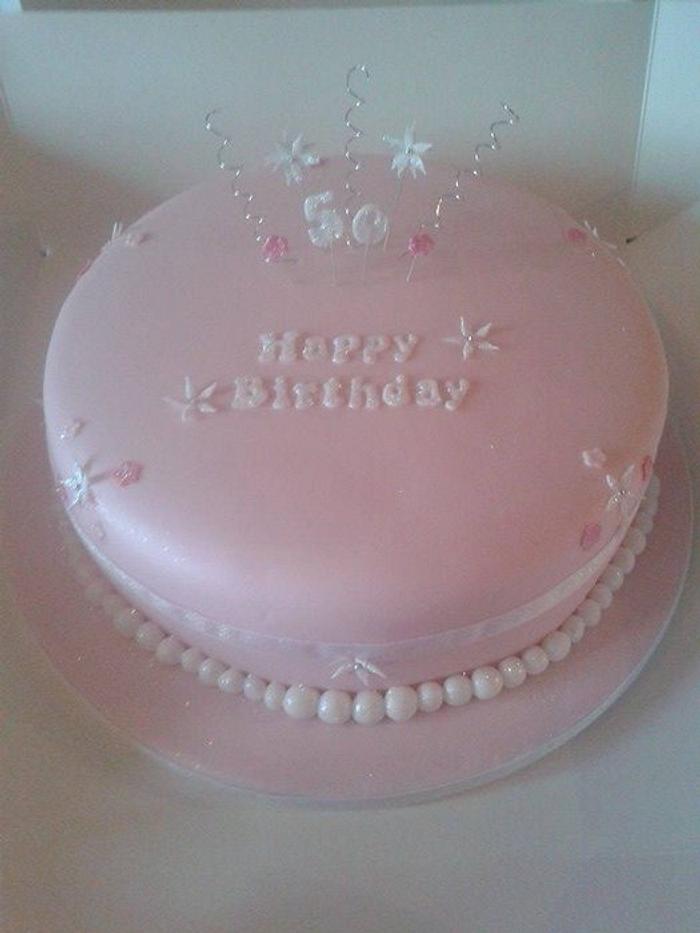 Pink 50th birthday cake