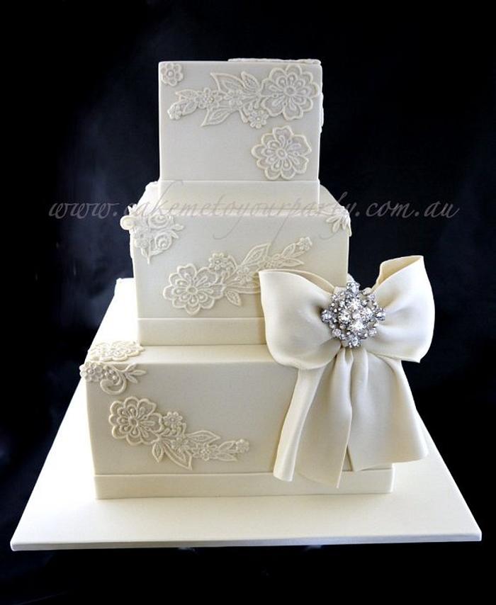 Vintage Lace and Diamonte Bow Wedding Cake