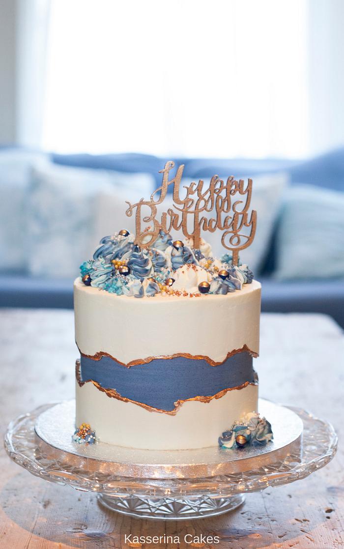 Fault line cake with blues and golds