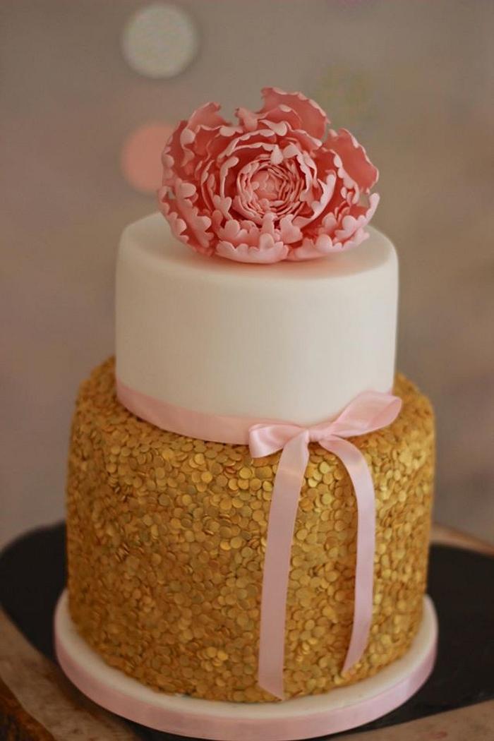 Gold sequin cake with pink peony