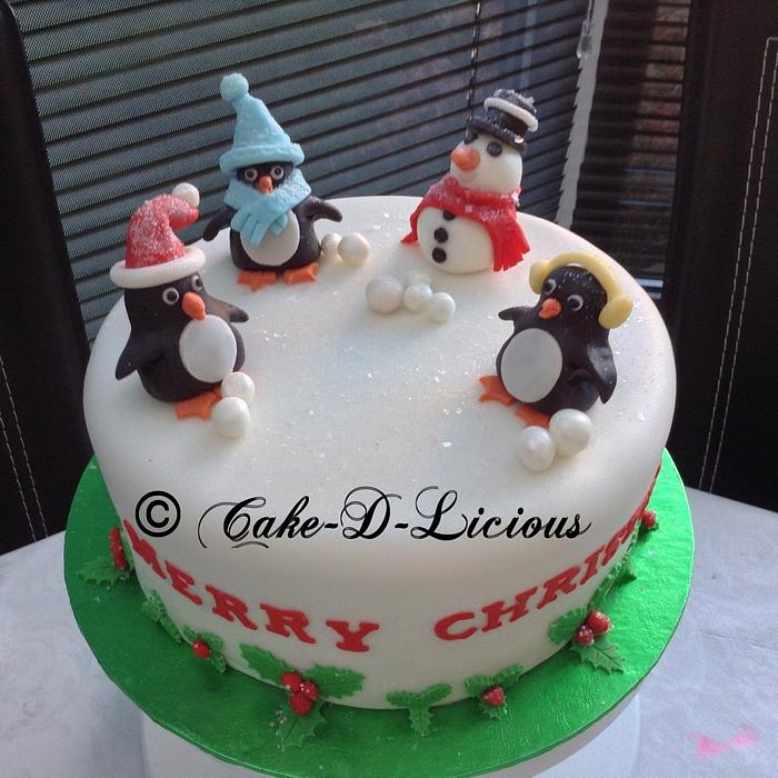 Christmas cake with penguins and snowman