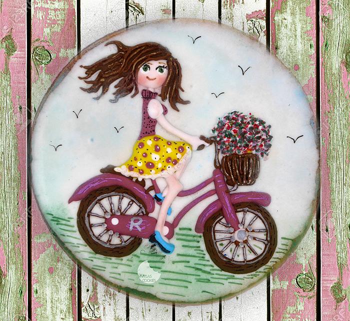 Girl on a bike cookie