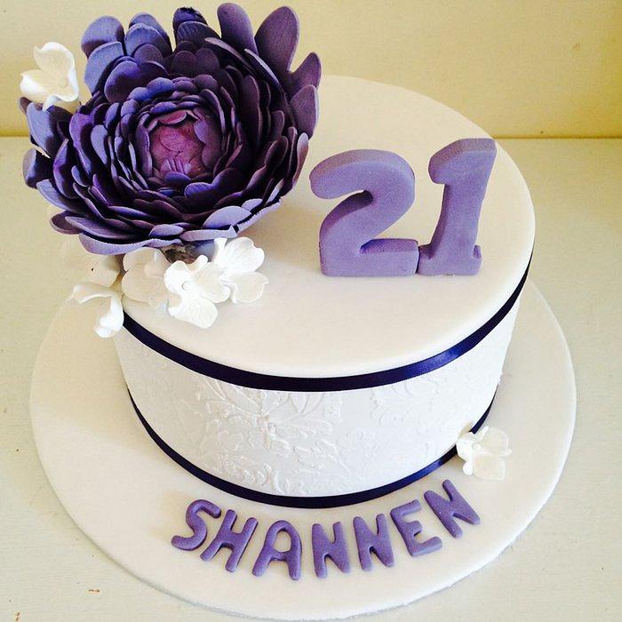 Stencilled 21 st cake with sugar flowers