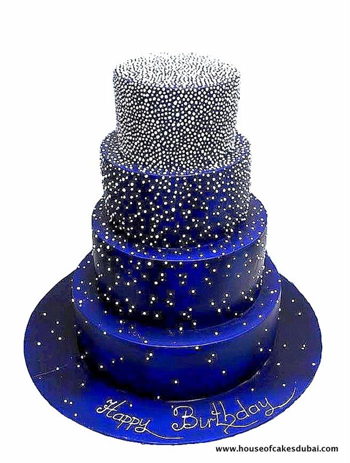 Indigo cake with white dots
