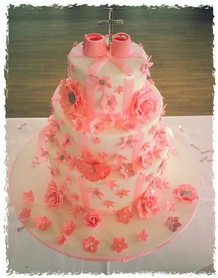 double sided baby girl christening cake with fantasy flowers and booties