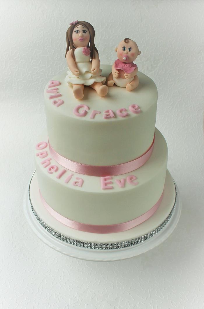 Joint christening cake for sisters