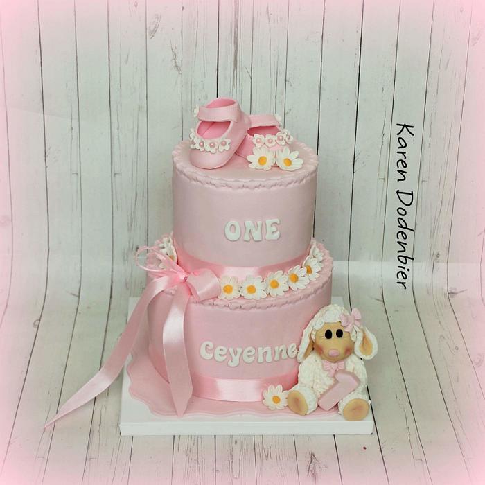Pink baby shoe cake