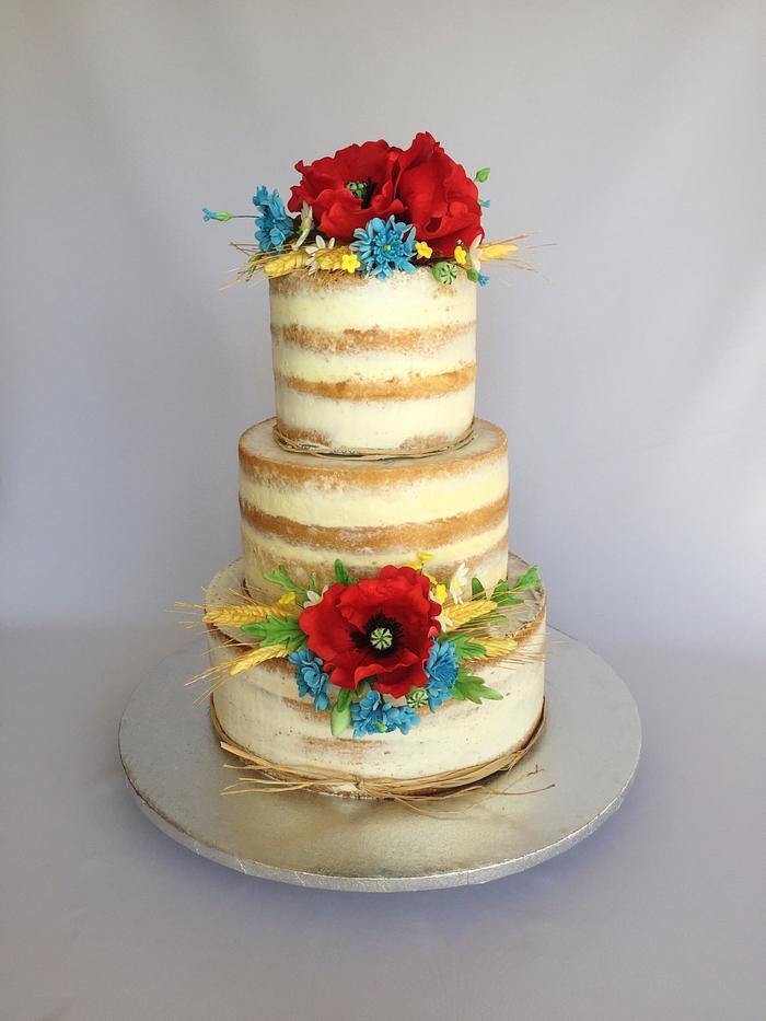 Naked Wedding cake with meadow flowers