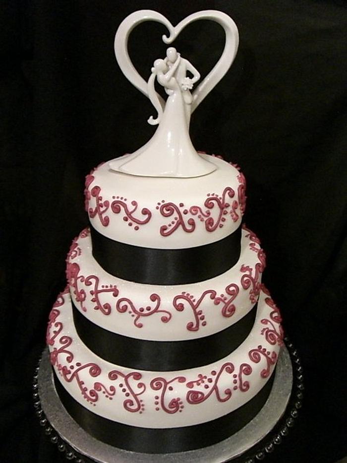 3 Tiered piped design wedding cake