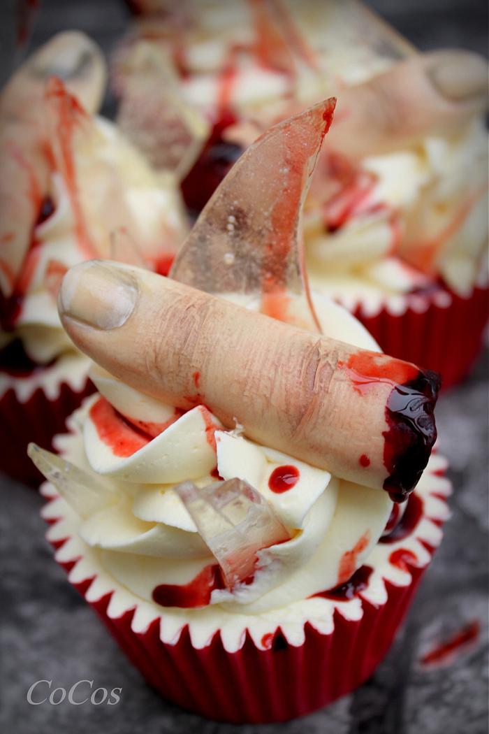 fondant finger and edible glass shard halloween cupcakes