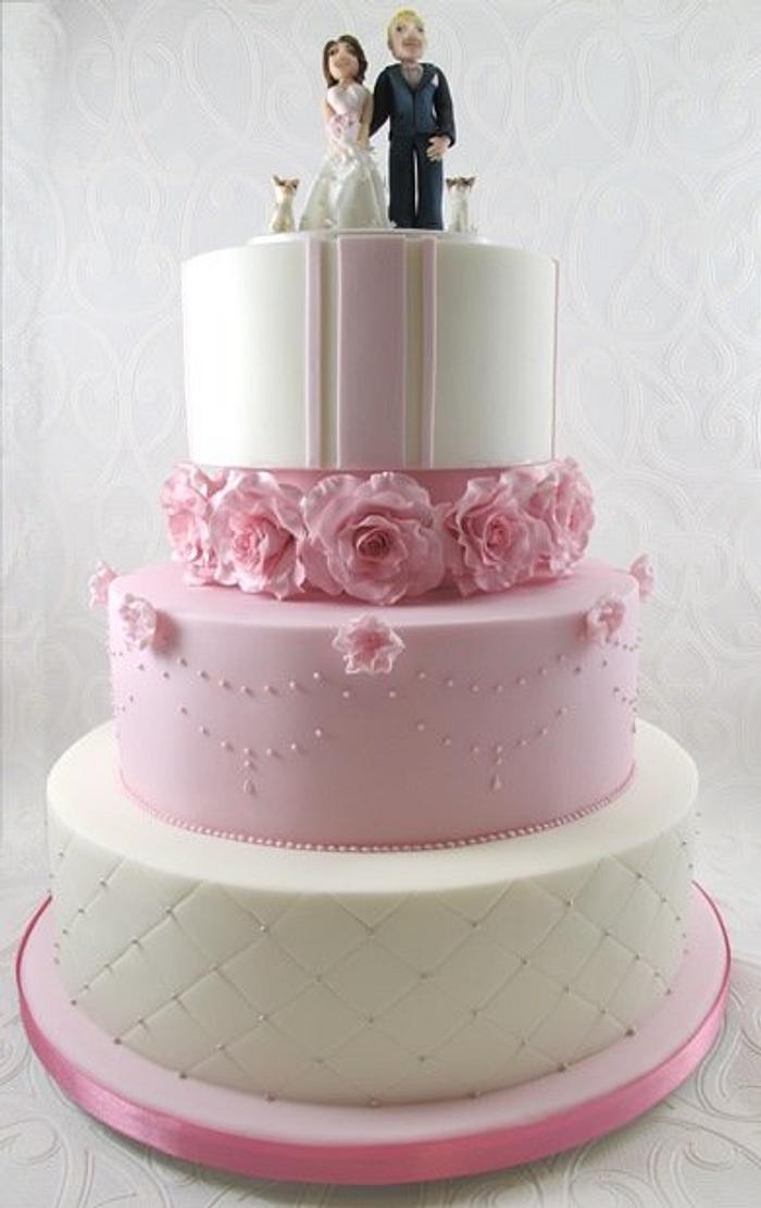 Pink Wedding cake with custom topper